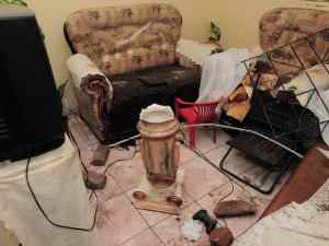 Rocks and bricks lie inside a house in Chiawelo, Soweto, which belongs to a former ward councillor. The house was stoned and her car was burned by an enraged mob who do not want metered electricity boxes in their houses