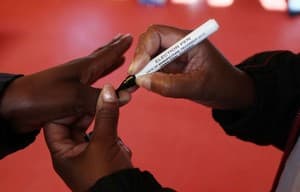 Residents in Sicelo Township, Midvaal, cast their votes, being marked with the blue ink so's not to repeat voting