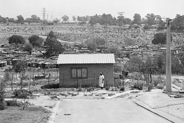 Mirriam Mazibuko watring her garden in an RDP houseZone 8, Far East Alexandra; It has one room, and she has four children who cannot live with, and they live with Relatives in Johannesburg.