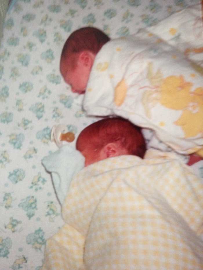 Elizabeth on top Michael on bottom. This was their favorite sleeping arrangement for months. Notice Mike has Pacy. Elizabeth soon learned to suck her thumb like her Mommy!!!