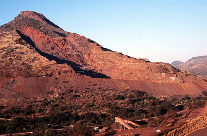 Thatba(means Mountain) in this case Thabazimbi means Mountain of iron- several pits have been established on the mountainous region underlain by steeply dipping Banded Iron Formation