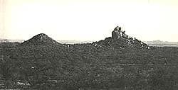 The two 'koppies' that the baPhalaborwa regard as sacred ground. Right: Sealene - (spread the blanket) - the original place of residents and the burial place of chiefs and sub-chiefs. Left: Mmodimulle "(the Gods have eaten") where the chiefs' mother