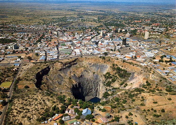 Aerial view of Kimberley, the type of locality of Kimberlite - the primary source of diamonds. Kimberley Mine open Pt ("Big Hole") in the foreground, and De Beers mine open pit in the background