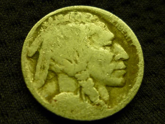 Date-less Nickel. This could have been a Key Date, but excessive wear has left this Nickel virtually worthless.