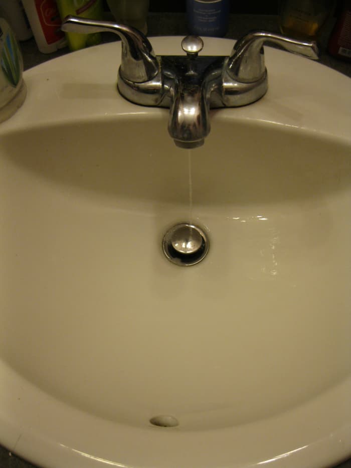 Calling a Plumber to Fix a Broken Pipe in the Bathroom - HubPages