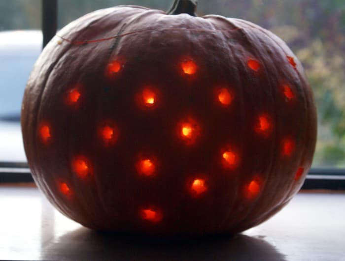 We loved this idea, we chose to do a traditional scary face at the front and this was the view from inside the house to light our front room - very pretty!