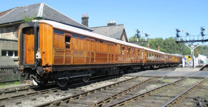 A train of Gresley stock moves through Grosmont station in the Whitby direction. The nearest is an early - 1920s built - four compartment 61'-6" main line side corridor Brake 3rd