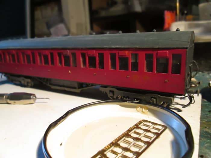 The roof has been temporarily set in place to show the appearance - MJT LNER-type torpedo vents fixed in place before re-numbering (MJT door handle and grab rail etched fret in foreground)