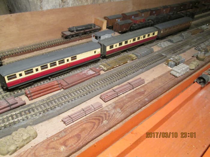 Three 1980s Hornby Gresley 61 foot side corridor stock (compartments had doors to the outside as well as to the corridor). Modified with brass and white metal underframe detailing
