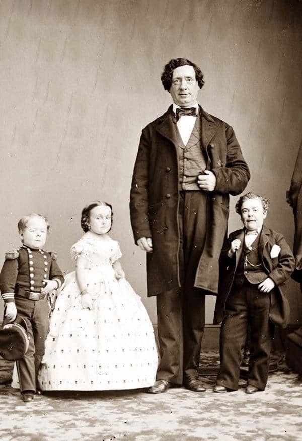 Gen. Tom Thumb (Charles Stratton) and Lavinia Warren on their wedding day with Commodore Nutt and the Giant.