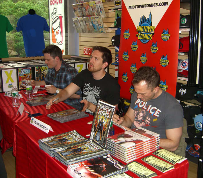 (From left to right) Comics writers Scott Snyder and Kyle Higgins with comics artist Trevor McCarthy at a signing for Batman: Gates of Gotham at Midtown Comics Downtown in Manhattan, May 19, 2011.