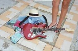 Guitar, clothes and legs | Initial logo for Jamaica Blues Jam | Taken at Hedonism Resort Jam in Jamaica