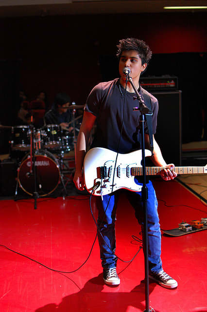Costumes add much to your act, but not every act needs a costume. Rock bands, in particular, give off a cool vibe when members look as though they put minimal effort into their appearance.