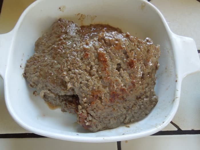 Now that all steaks are done, put them in heated dish to stay warm. Cover if you can. (Spots that appear red here are really browned spots from cooking.)