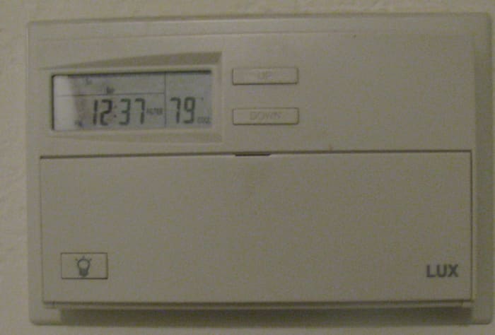 Smart grids would link programmable thermostats like this in private homes to centralized control centers to regulate power usage.