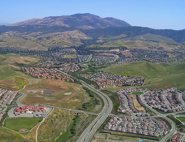 Urban sprawl typically looks like this where hundreds or thousands of homes are built in one location. Every one of these homes is managed on credit from the bank where a default can mean foreclosure.