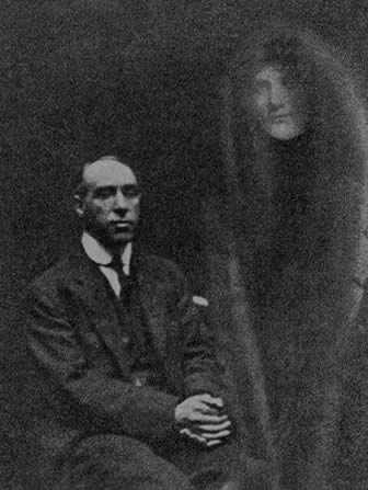 One of William Hope's faked "Spiritual Photos". He was discovered when one of the spectral visitors was recognized as someone who was alive and well.