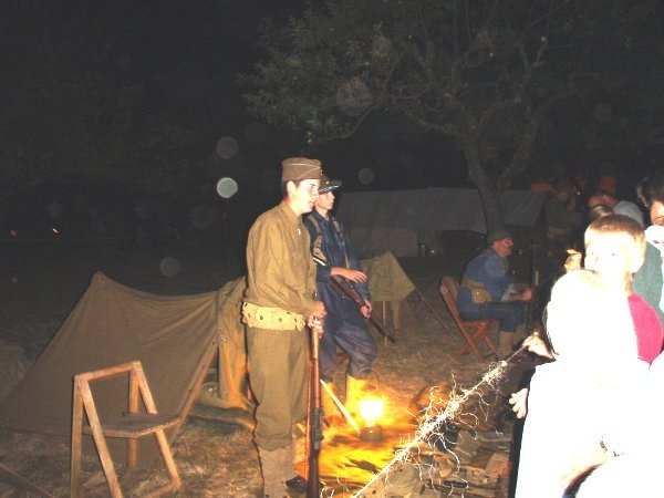 This was taken during a tour at a fort in Washington State, which had a history of paranormal activity. There were camp fires, as evident in the picture, people smoking and light rain on and off while we were there.