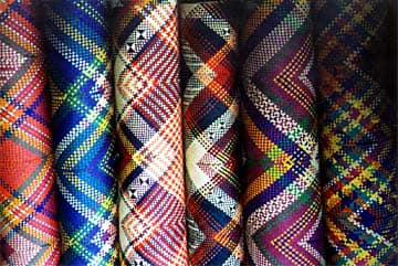 A variety of attractive native mat designs. Sometimes it is too hard to choose which one to take home.