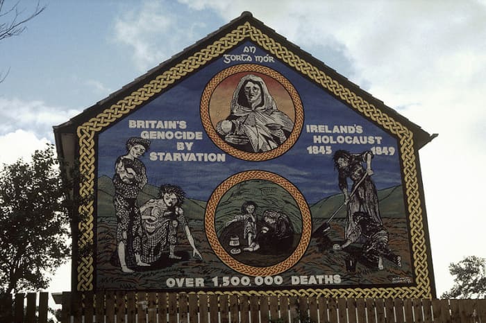 Ireland's Holocaust mural on the Ballymurphy Road, Belfast. "An Gorta Mór, Britain's Genocide by Starvation, Ireland's Holocaust 1845–1849."