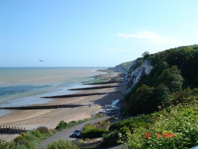 Holywell, Eastbourne: walking down the steep pathway from street-level to the lower promenade, far end of the western promenade.