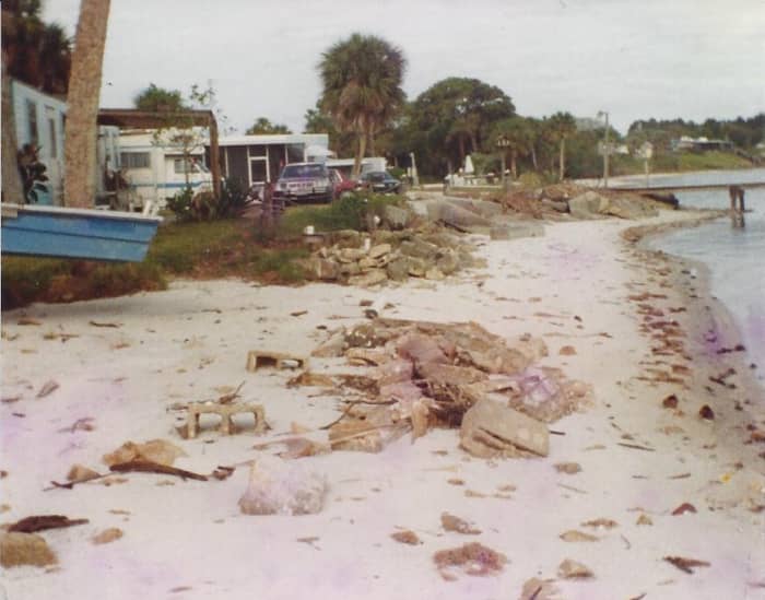 You can see how close to the water my John boat was. That is why I rigged it atop of a three roller platform, so the water could roll under it in the storms and not beat it to a pulp against the rocky shoreline.