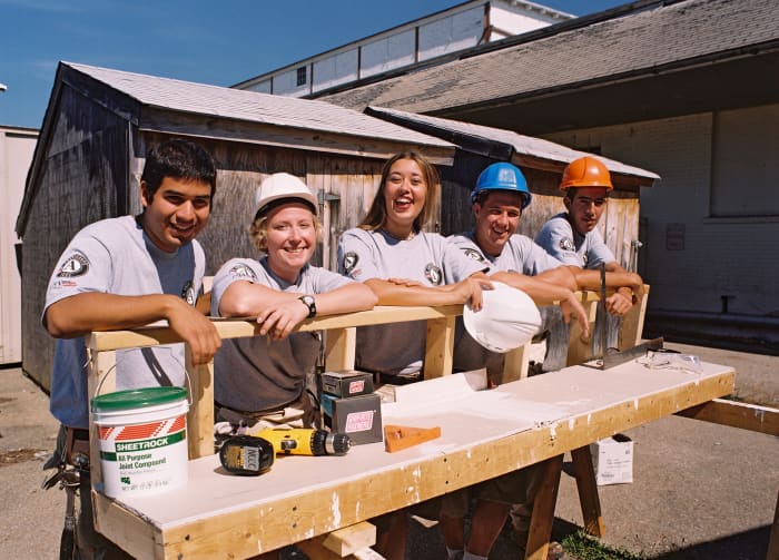 Teens volunteering...maybe this was on their bucket list?