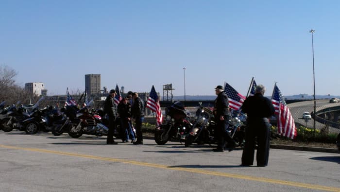 Some Patriot Guard riders carry a flag. They ride in certain positions during the funeral procession.