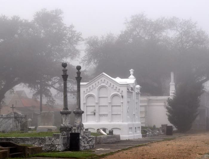 These in Masonic Cemetery in the fog- all graves here are owned by Masons, many of which are buried by "Lodge." The coping style grave in front is the Hiram Lodge 70, the large white tomb is Alpha Home Lodge 72.
