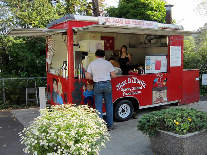 Food wagons are generally parked in an area close to a nice picnic spot!