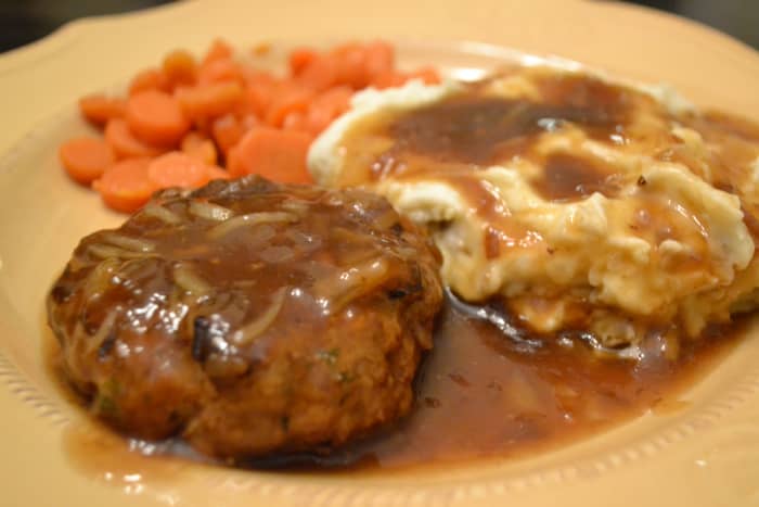 These Salisbury steaks are tender, moist and juicy, especially when smothered and simmered in onion gravy.