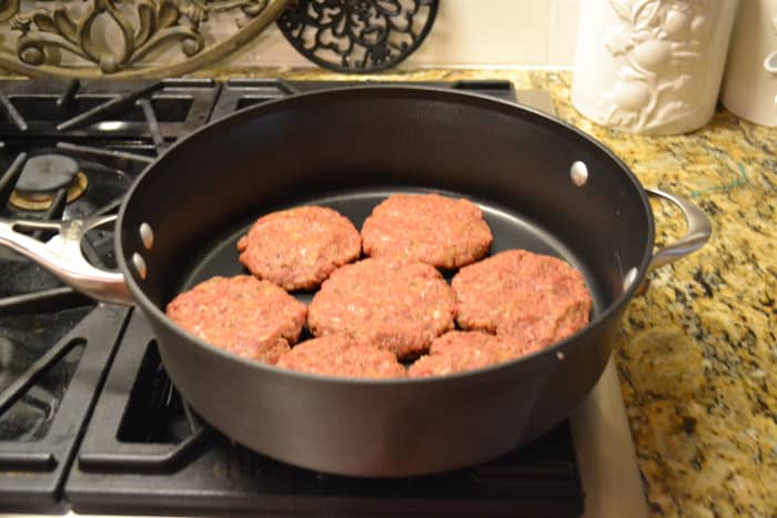 Mix meat with breadcrumbs and seasonings, then mold into six or seven equally sized patties.