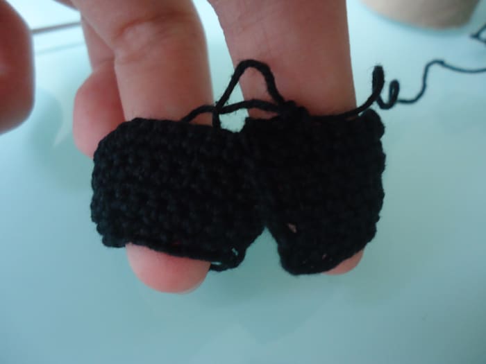 This is how this Round should look like. The two sides meet together to form tabs where you can sew on your snaps later.