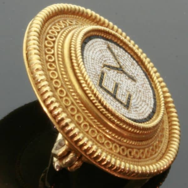 micro mosiac jewelry by Castellani 1870 and 1880 in, what is called, the Castellani's "Periodo Moderno", a period in which Castellani's master goldsmith and designer Michelangelo Caetani, was strongly focussed on designing micro mosaic jewelry with