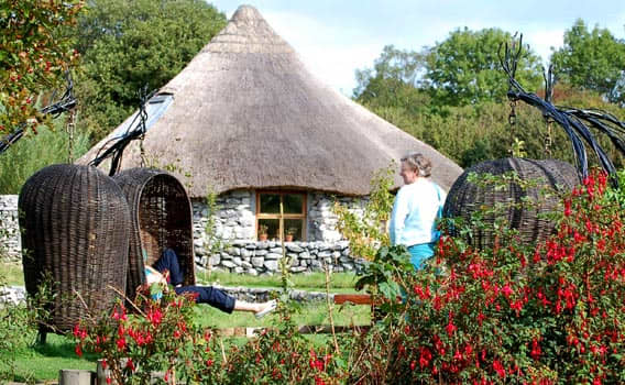 Brigit's Garden in Galway, Ireland. Reconstructed stone Celtic roundhouse. Represent one of the Celtic festivals of Samhain ( the end of summer)