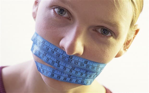 This is where the article about the new research on fasting is. The picture is a woman with a tape measure around her mouth from the article. You can click on a picture for a better view of it!