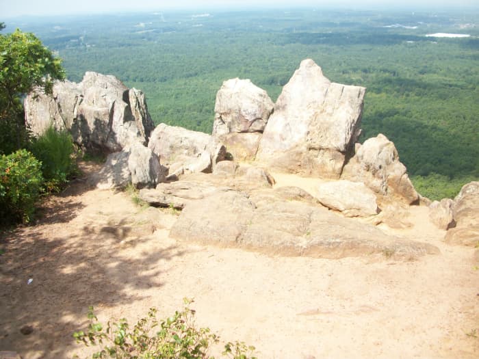 View from the King's Pinnacle. You must hike The Pinnacle Trail to get to this point. You must also climb a few big boulders to get to this view. Photos are provided below.