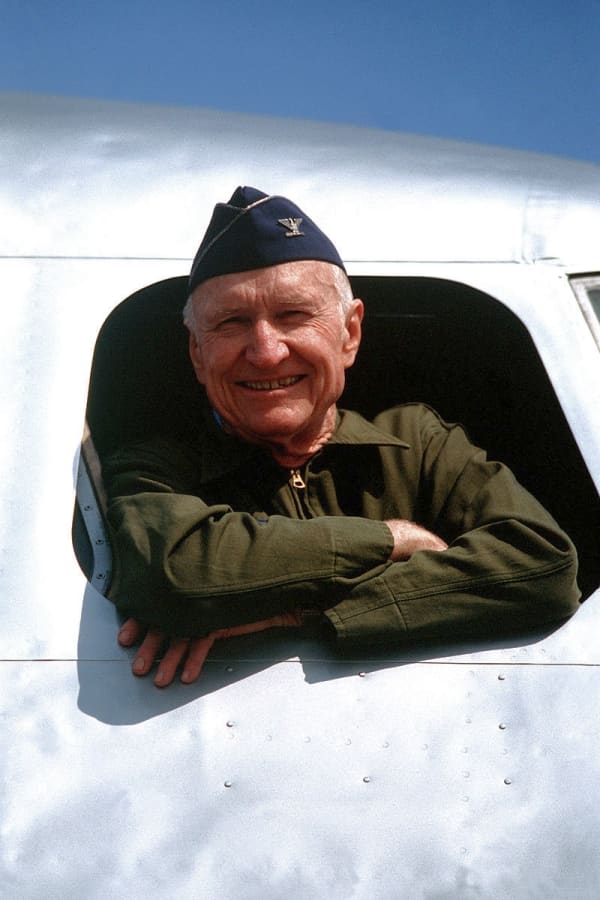 Colonel Gail S. Halvorsen leans out the window of a C-54 Skymaster during ceremonies at Tempelhof Airport commemorating the 40th anniversary of the airlift (May 12 1989).