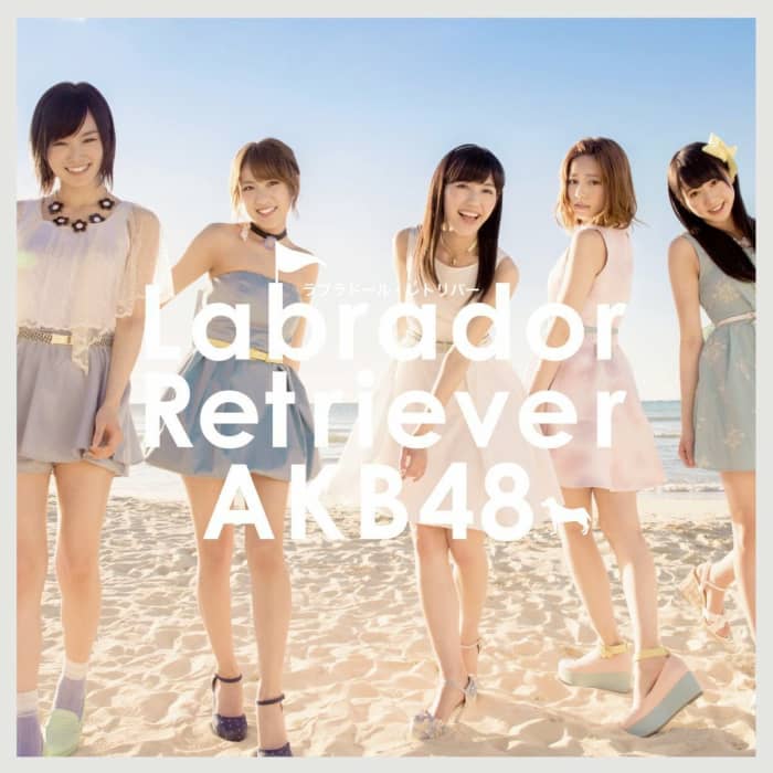 On the cover are Sayaka Yamamoto, Minami Takahashi, Mayu Watanabe, and Haruka Shimazaki. The girls had to go to Hawaii to film the music video for the song. All these girls are standing near the waves of the beach.