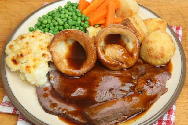 How about a Sunday roast with all the trimmings? Yorkshire puds, roast spuds, roast beef and gravy, peas, carrots and cauliflower...