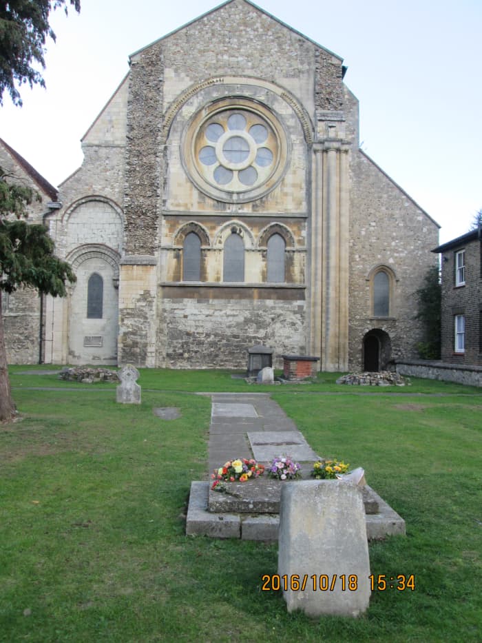 Viewing over Harold's burial site to the 'cut-off' church end, you can see the point where the original church ended, marked on the ground by kerb stones that follow the line of the wall.