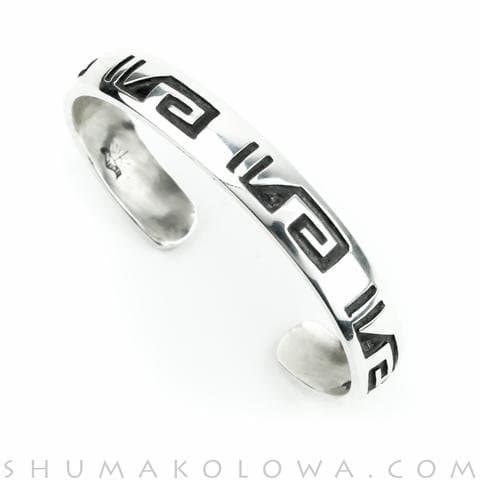 Hopi Summer Cloud overlay cuff bracelet. Made by Hopi native Anderson Koinva.