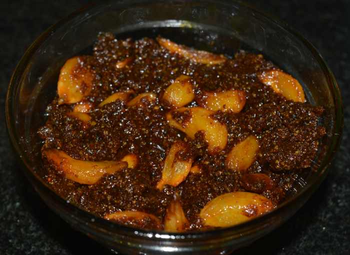 Store garlic pickle in a glass bowl or jar. Consume it after a week. By this time, the pickle sets properly. No need to keep it in the refrigerator.
