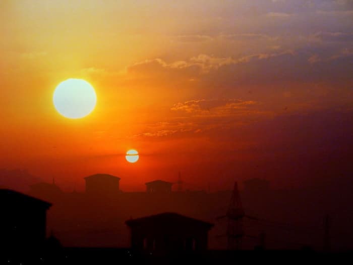 Although this photo can be found on an article asking the question How Would Earth Look Like If It Had Two Suns, it doesn't discount the authenticity of the photo itself.