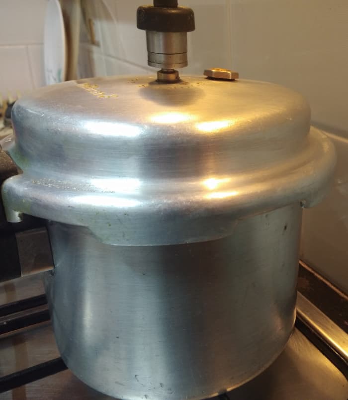 Close the lid and pressure cook for 4-5 whistles or till lentils are soft. Turn off the flame and let the pressure release by itself.