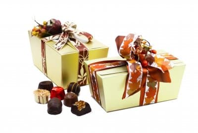 Gold boxes and ribbon from Dollar Store. Fill with home-made chocolates or cookies. I include a "use by date" on the tag or "open now" to keep fresh.