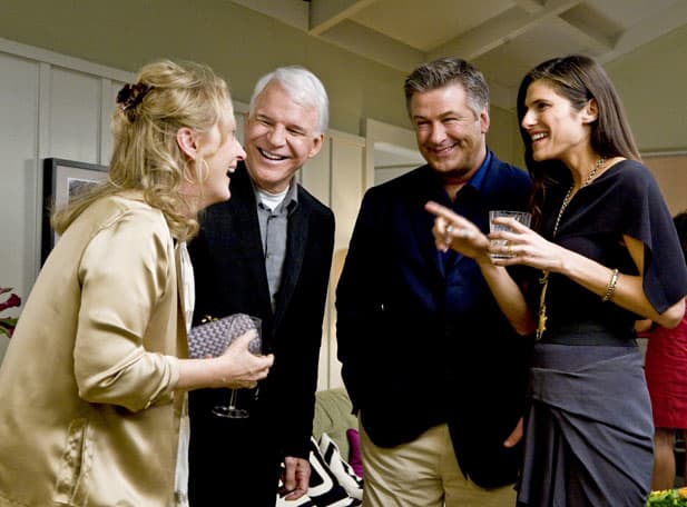 Jane, Adam, Jake and Agness are at Luke Adler's graduation party. Scene from the movie "It's Complicated".