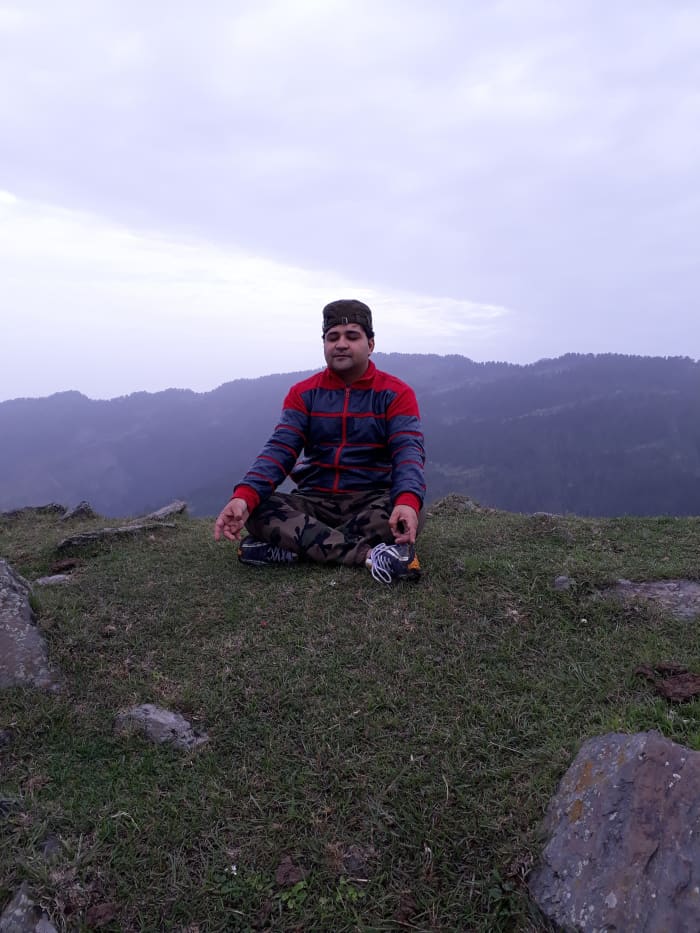 It was 6 am and there was only one local boy who clicked this photograph of me. When he had gone, I sat there for 30 minutes. I was able to hear the flapping of all the birds that were while flying above my head. This area was so peaceful.