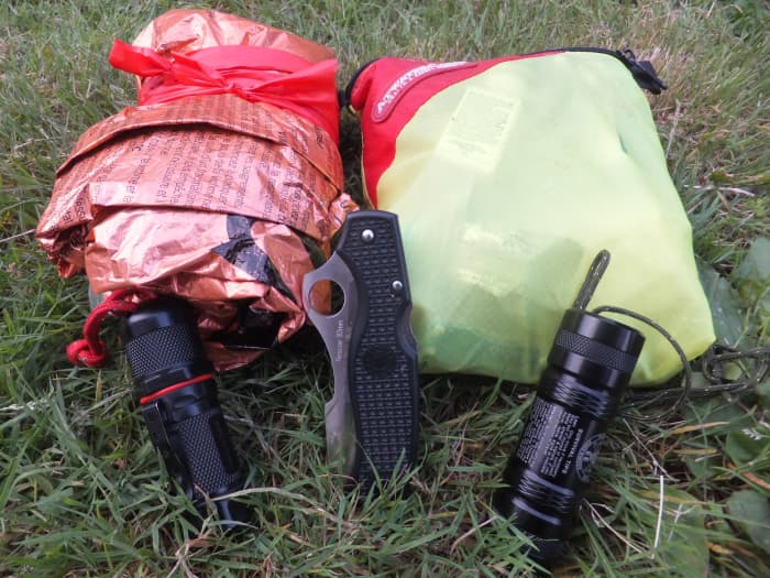Carrying the right survival kit can mean the difference between life and death in the wilderness.