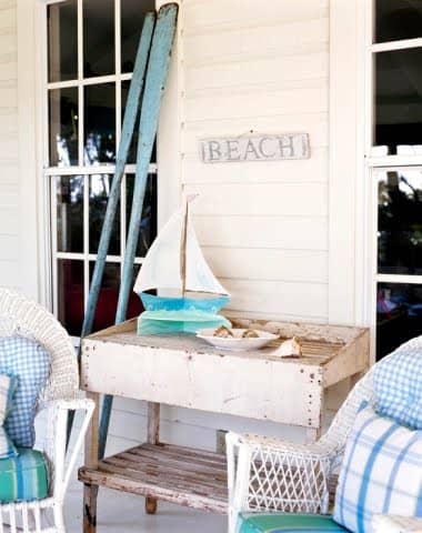 Notice the Casual finds this home owner has found. Rustic signs, a painted old table, simple fabrics.